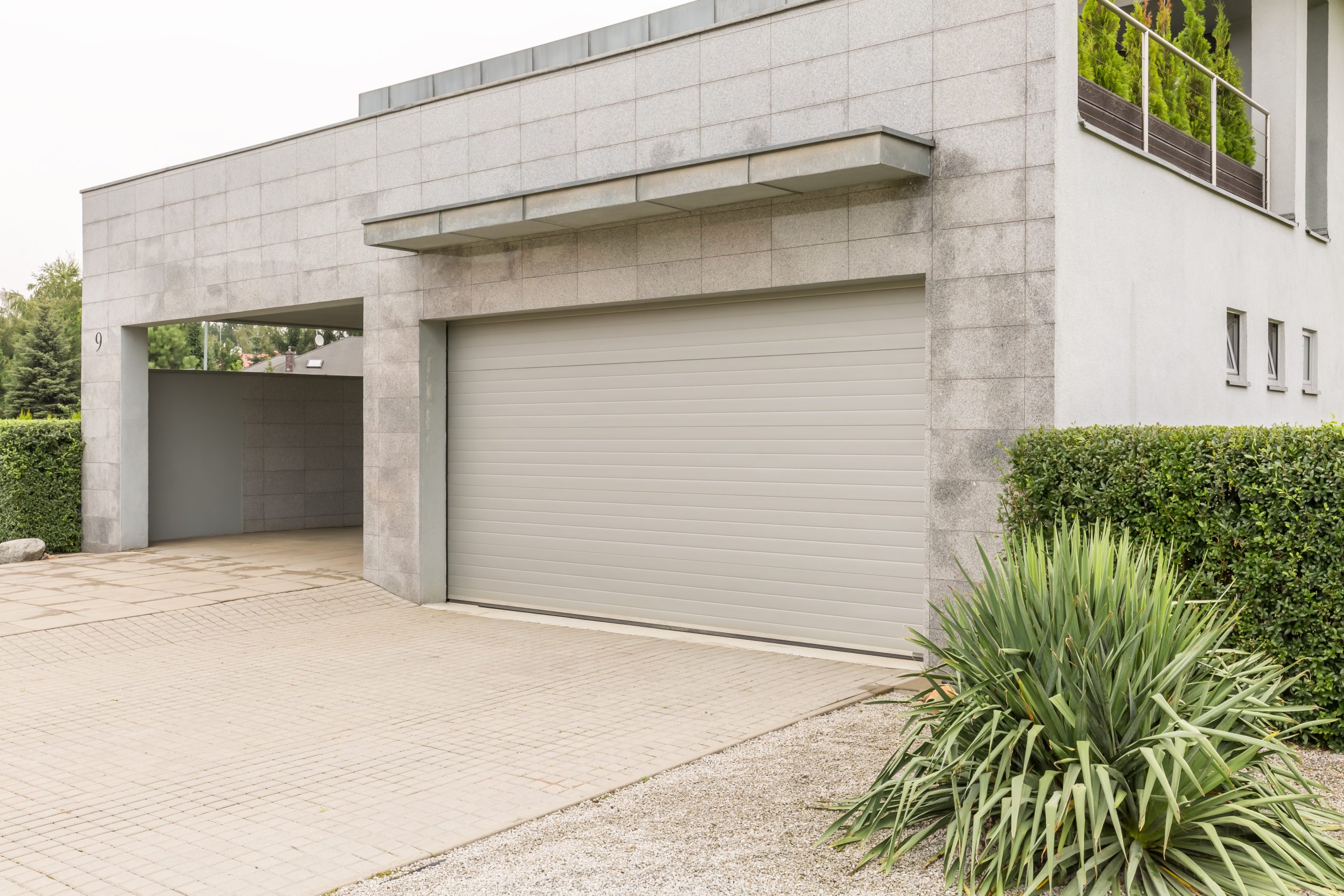 Read more about the article The Essential Guide to Garage Door Maintenance